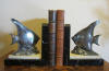 silver plated metal art deco bookends: fish, scalairs on marble base. France, ca 1930. 