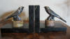 pair of art deco silver plated metal book ends; pair of swallows on marble base