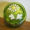 antique glass pill box decorated with an enameled flower
