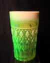 Stunning green and pinkish white antique vaseline glass / uranium glass drinking glass